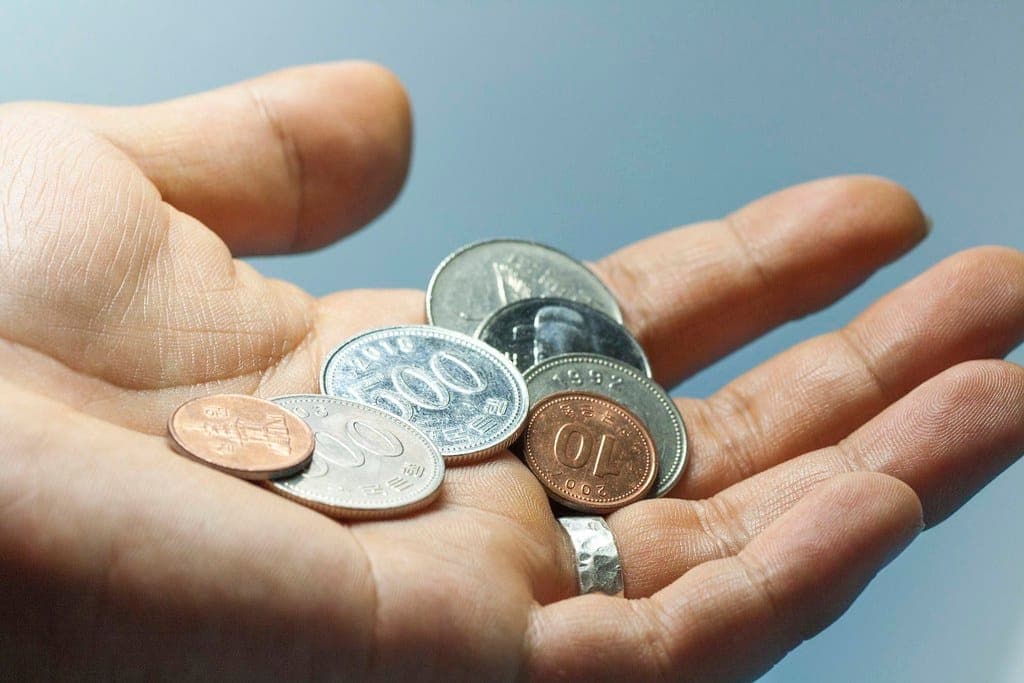 Korean coins and small change on a flat surface